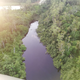 Another aerial view of the spill site, which appears to be entering a river.